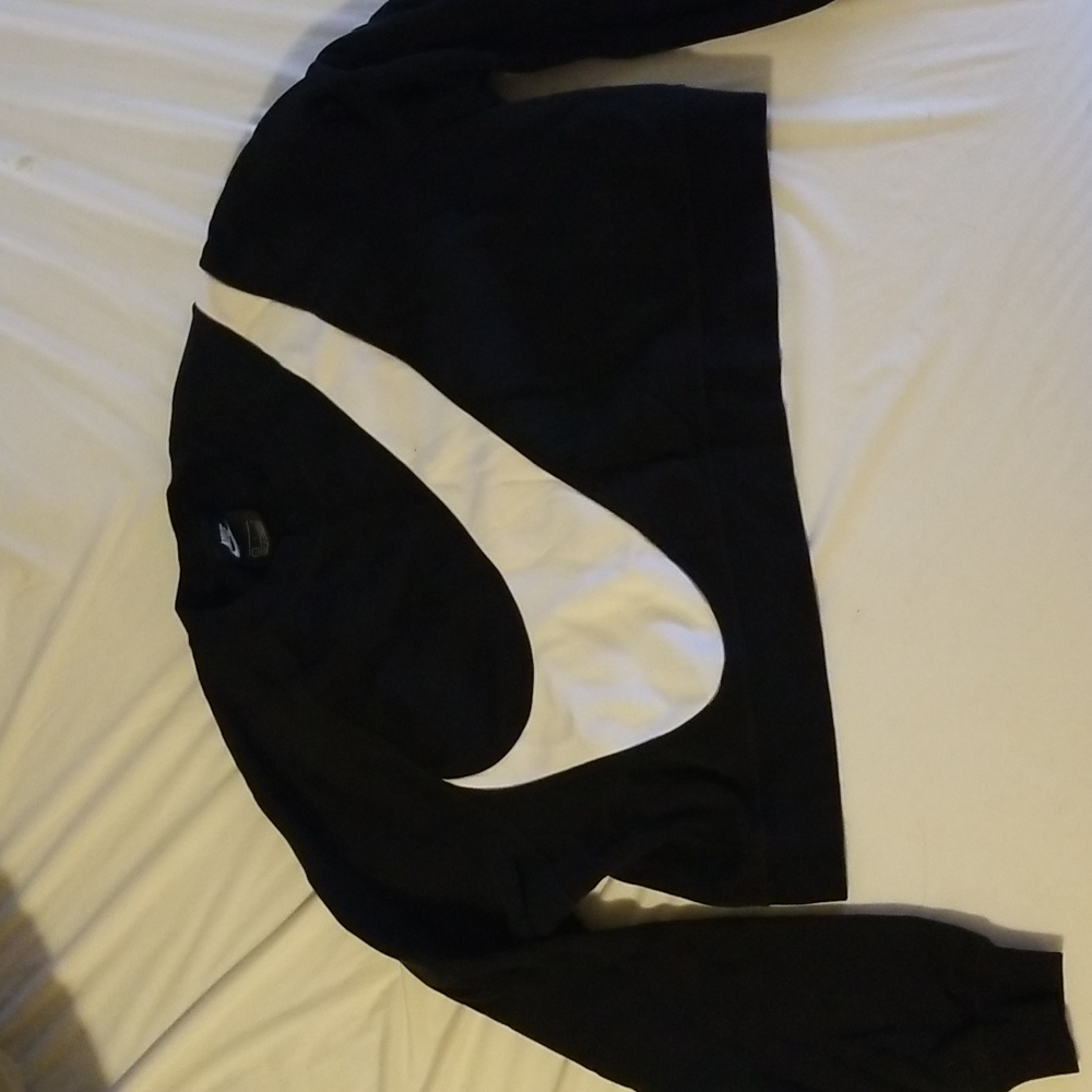 Nike sweatshirt. Women's size large cropped shirt. Black with white Nike swish.